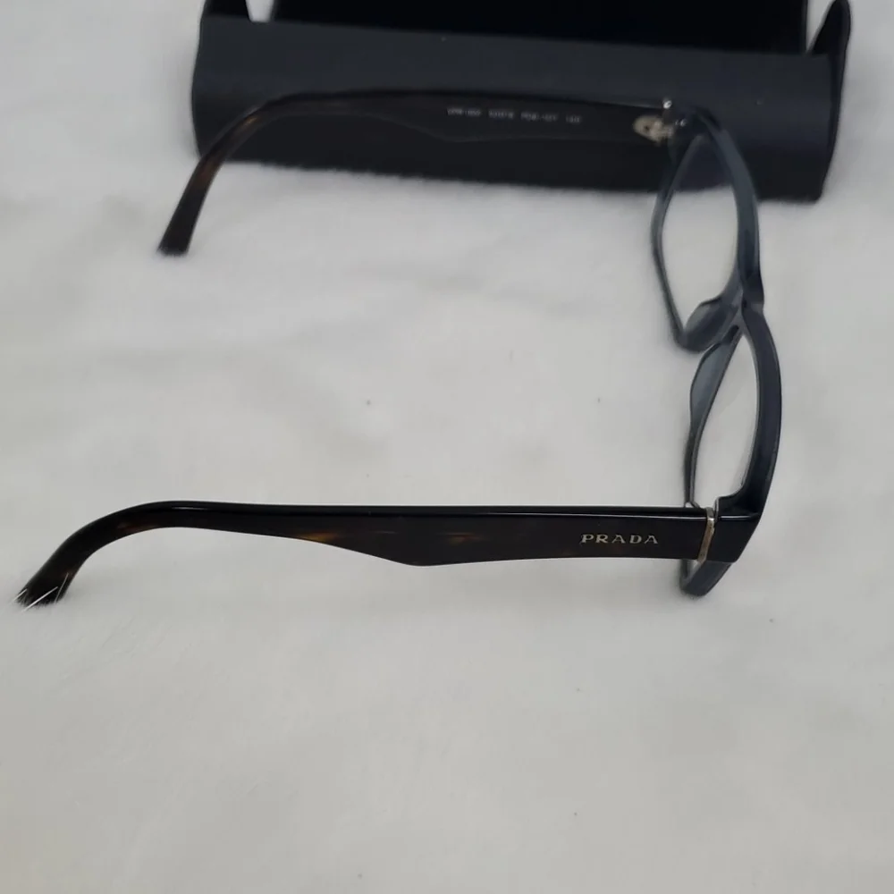 Prada used +2